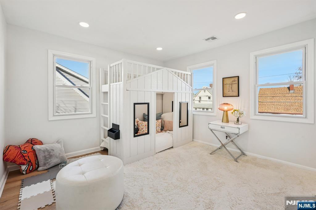 51 Highland Place Ridgefield Park, NJ 07660 - Photo 25 of 35 a living room with furniture and a window