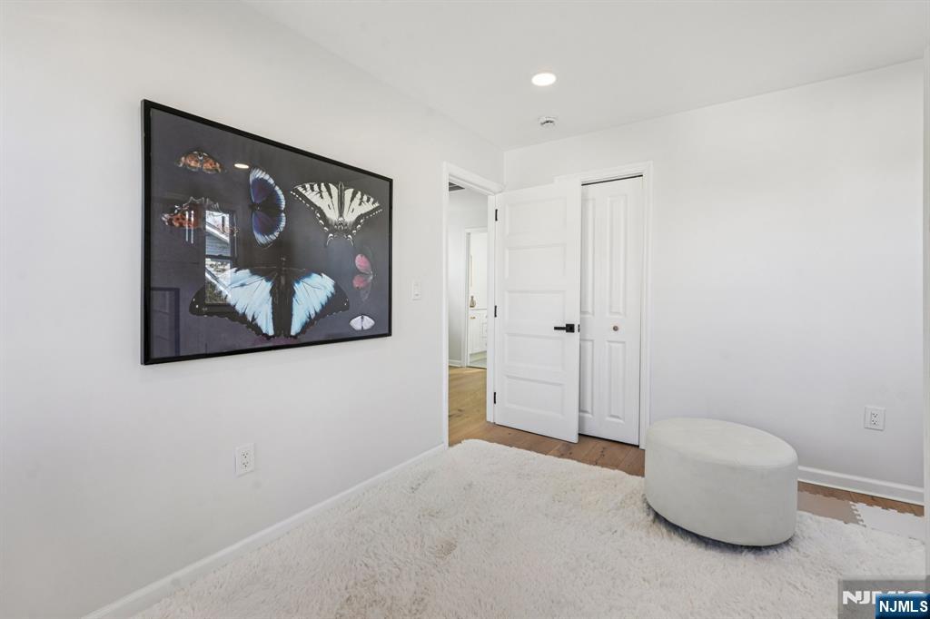 51 Highland Place Ridgefield Park, NJ 07660 - Photo 26 of 35 a view of an empty room with painting on the wall
