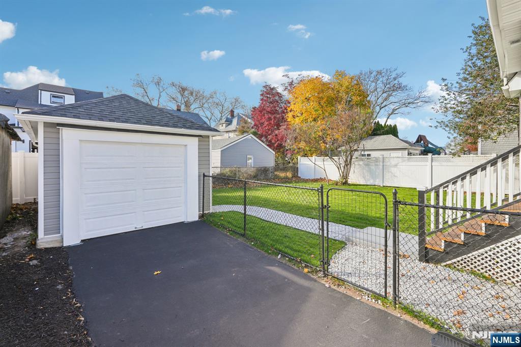 51 Highland Place Ridgefield Park, NJ 07660 - Photo 32 of 35 a view of a house with a yard
