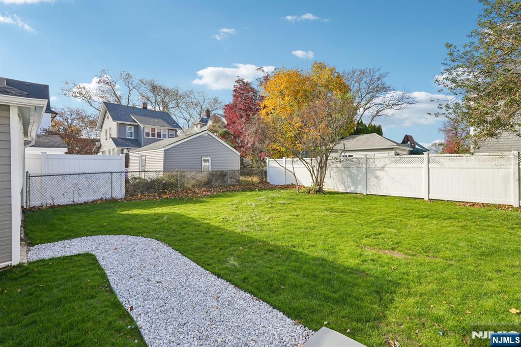 51 Highland Place Ridgefield Park, NJ 07660 - Photo 33 of 35 a view of a house with a yard