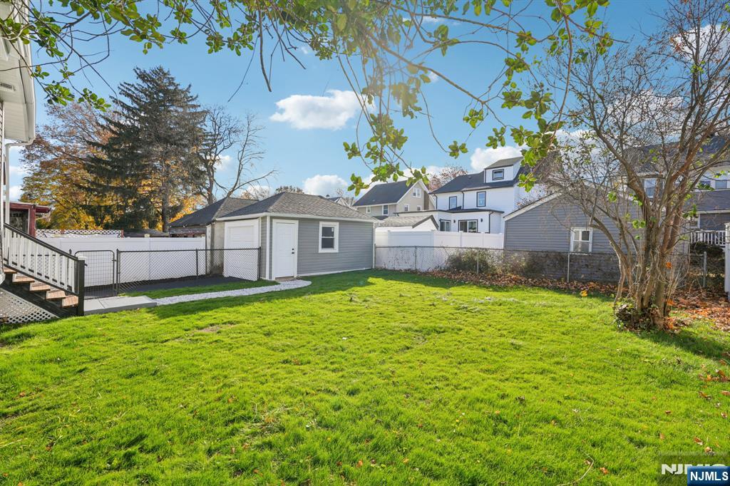51 Highland Place Ridgefield Park, NJ 07660 - Photo 34 of 35 a view of a house with a yard