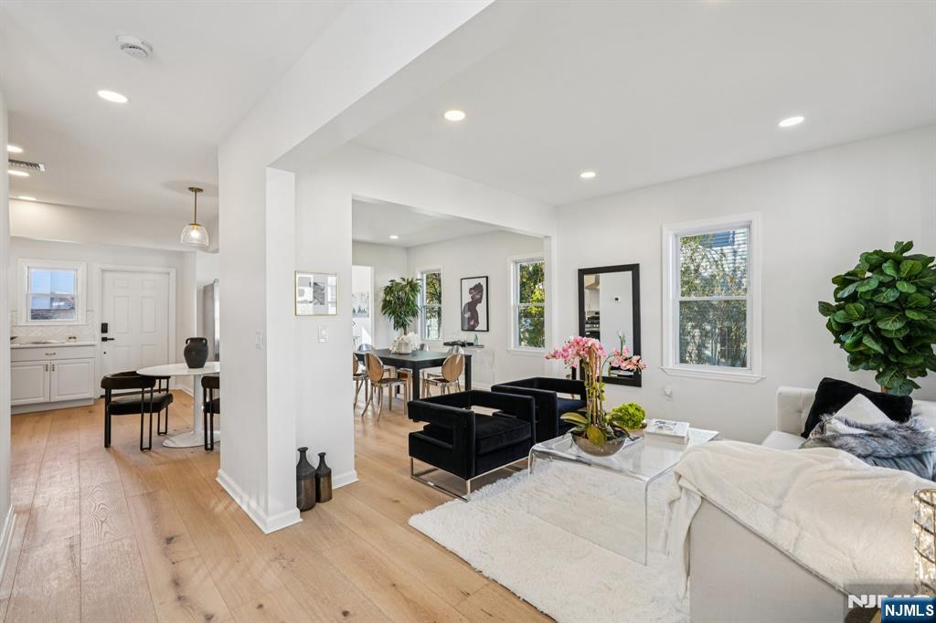 51 Highland Place Ridgefield Park, NJ 07660 - Photo 9 of 35 a living room with furniture and a large window
