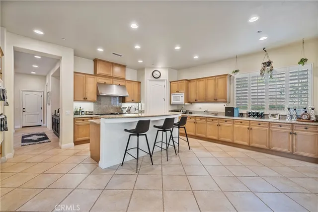 a large kitchen with cabinets