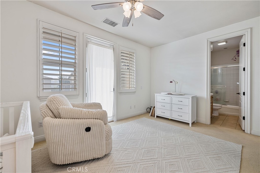4959 Shady Trail Street Simi Valley, CA 93063 - Photo 23 of 40 a living room with furniture and a window