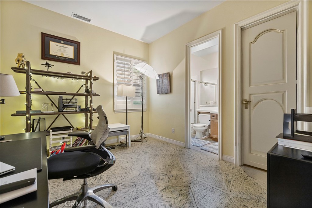 4959 Shady Trail Street Simi Valley, CA 93063 - Photo 24 of 40 a view of a livingroom with furniture and gym equipment