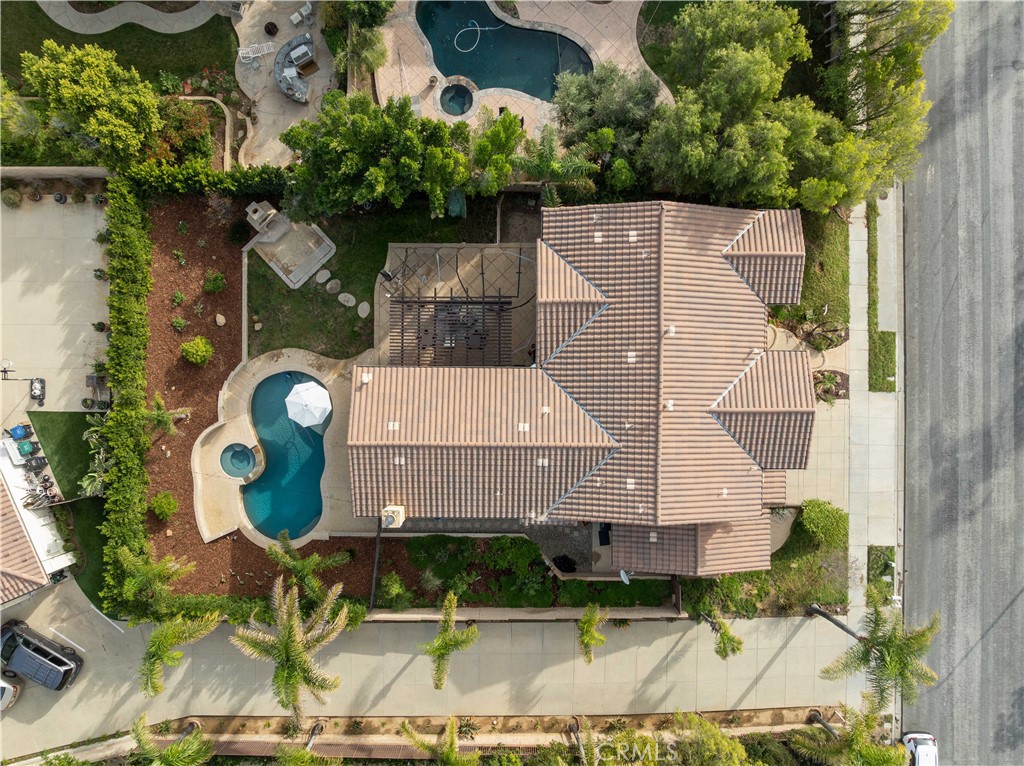 4959 Shady Trail Street Simi Valley, CA 93063 - Photo 38 of 40 an aerial view of a house with a swimming pool