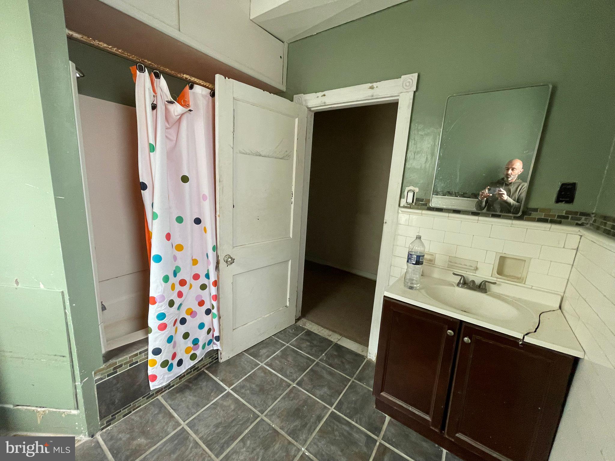 5809 Chew Avenue Philadelphia, PA 19138 - Photo 15 of 29 a bathroom with a sink and a mirror