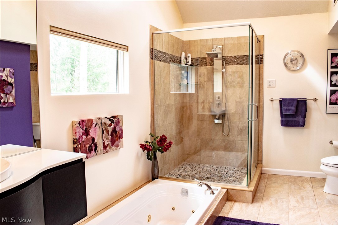 4309 Lander Road Chagrin Falls, OH 44022 - Photo 13 of 33 Master bath has skylight, 2 floating sinks, large shower and jetted tub