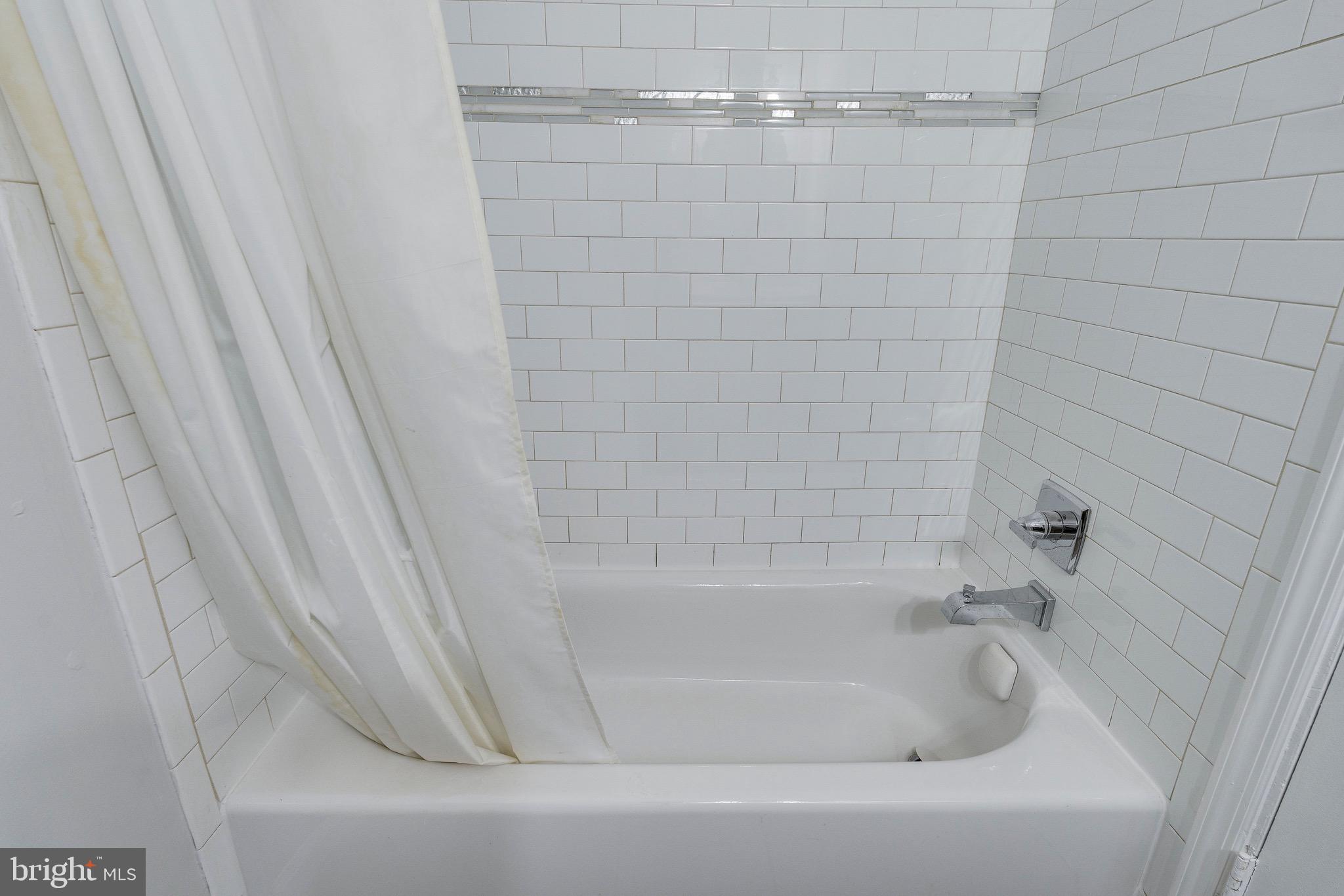 9808 Brixton Lane Bethesda, MD 20817 - Photo 22 of 24 a close view of a bathtub in bathroom