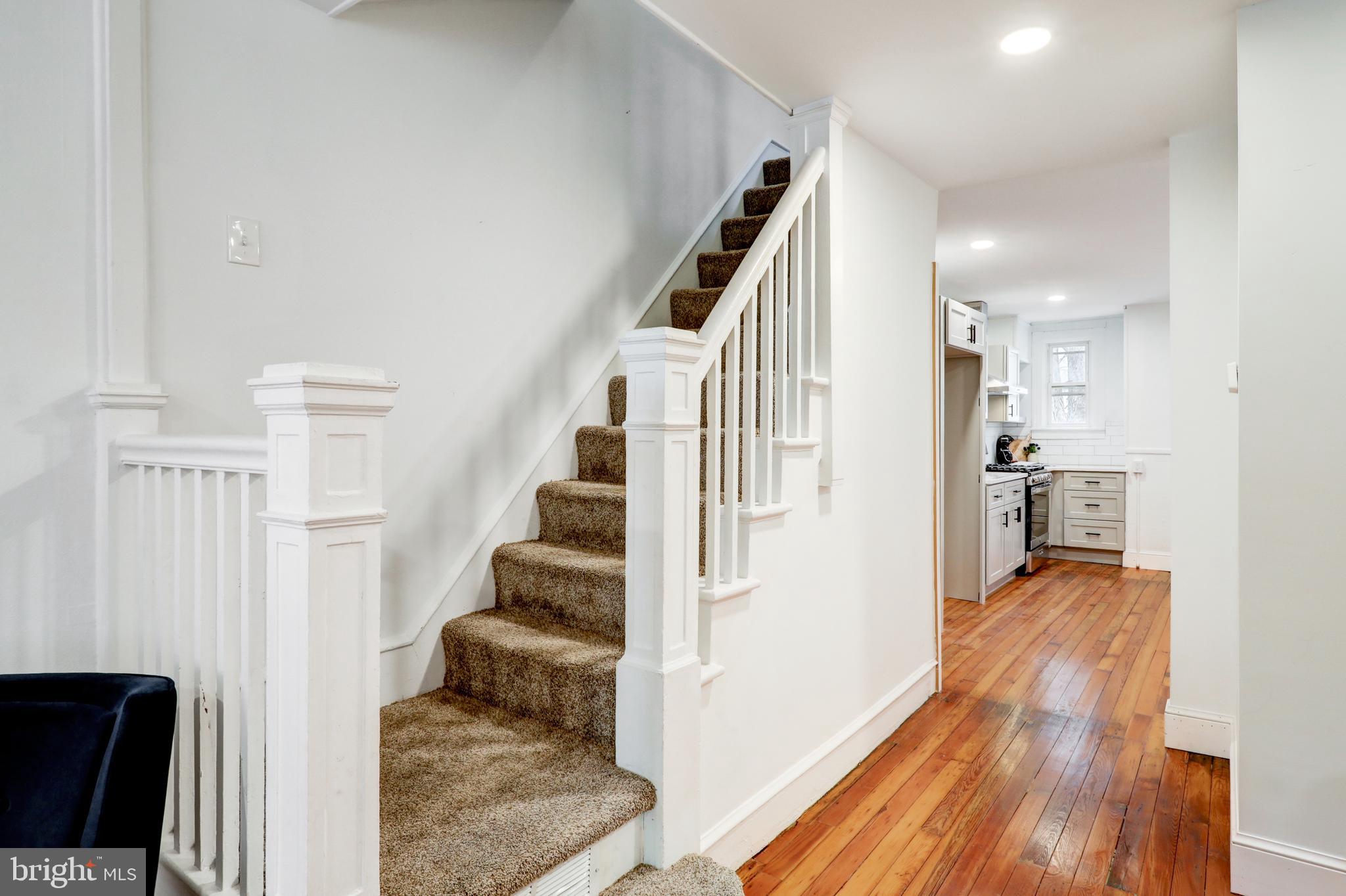 34 West New Street Lancaster, PA 17603 - Photo 7 of 31 a view of entryway and hall with wooden floor