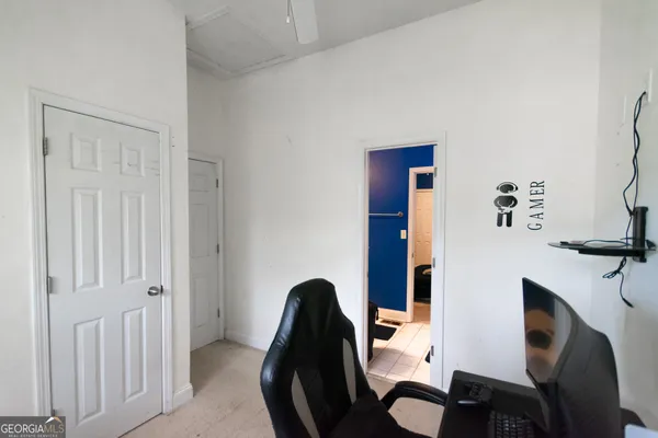 a workspace with furniture and wooden floor