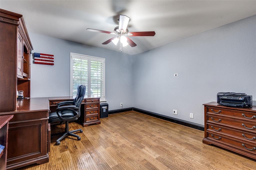 10355 Carry Back Circle Dallas, TX 75229 - Photo 20 of 35 a view of a workspace with furniture and a window