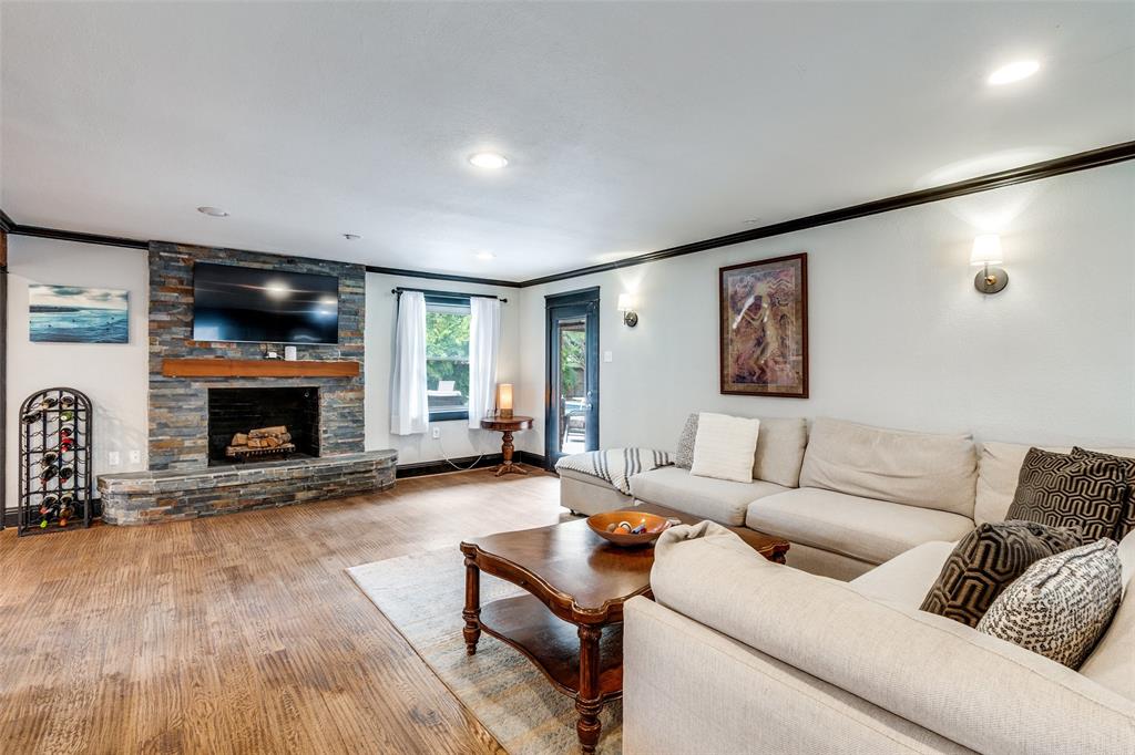 10355 Carry Back Circle Dallas, TX 75229 - Photo 2 of 35 a living room with furniture and a fireplace