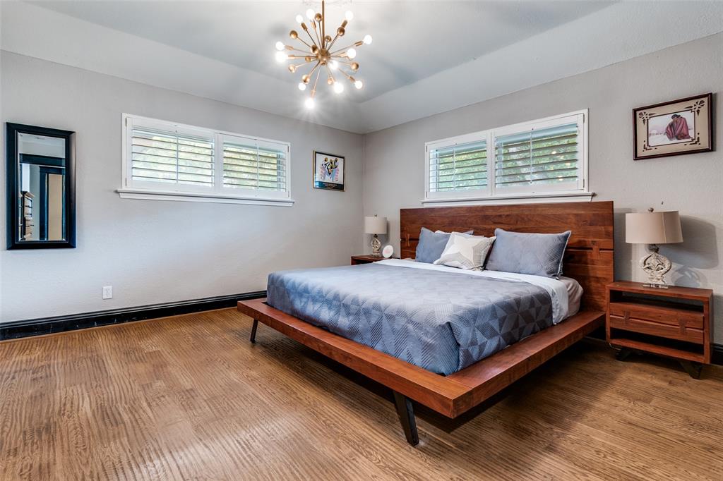 10355 Carry Back Circle Dallas, TX 75229 - Photo 23 of 35 a bedroom with a bed and window
