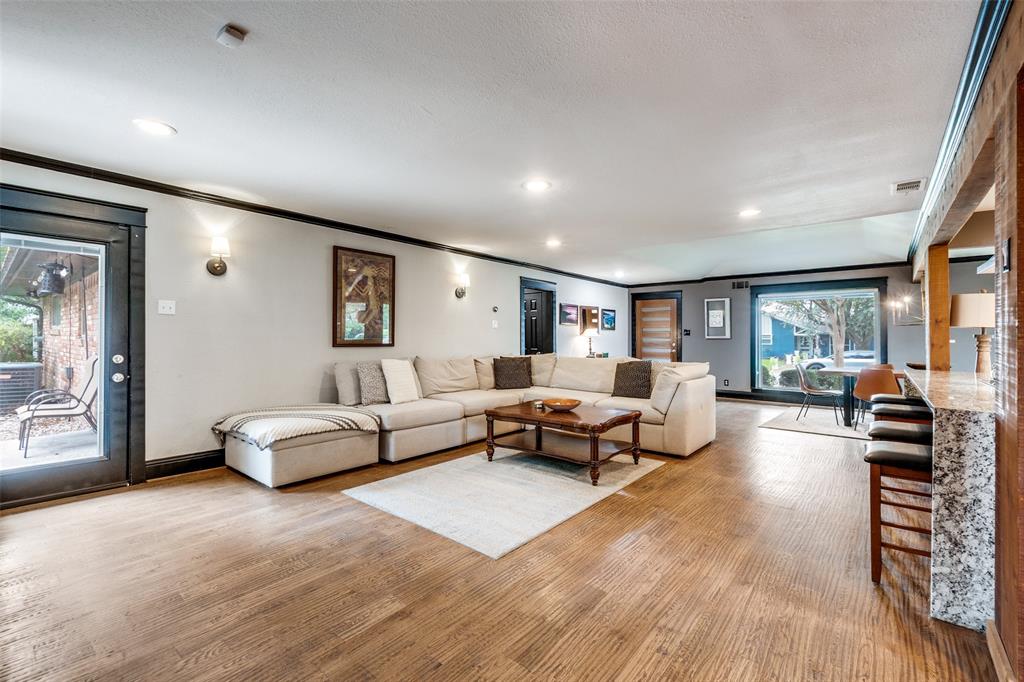 10355 Carry Back Circle Dallas, TX 75229 - Photo 3 of 35 a living room with furniture and a wooden floor