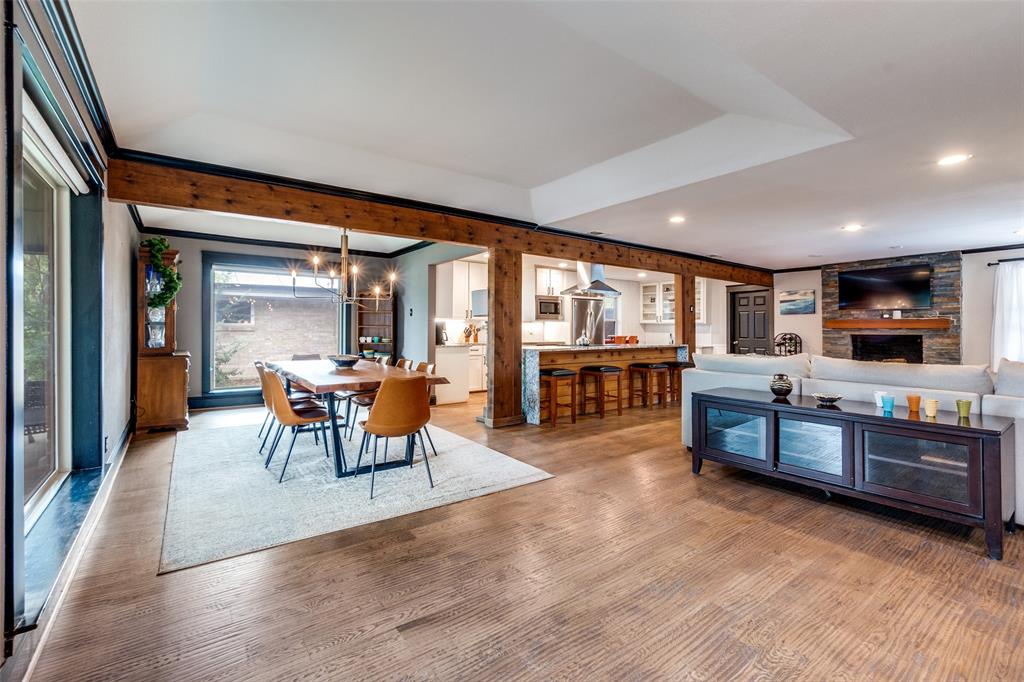 10355 Carry Back Circle Dallas, TX 75229 - Photo 4 of 37 a living room with furniture and a flat screen tv