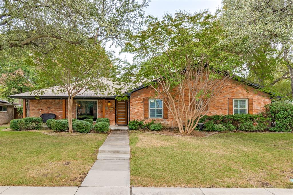 10355 Carry Back Circle Dallas, TX 75229 - Photo 6 of 35 a front view of house with yard and green space