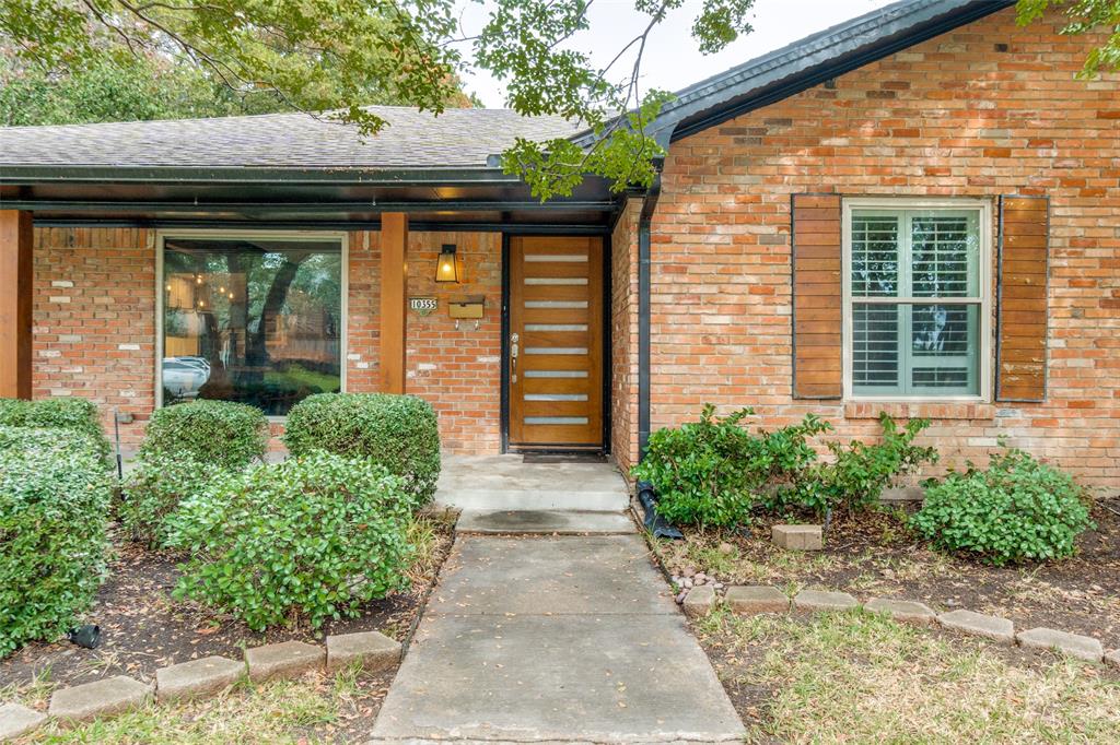 10355 Carry Back Circle Dallas, TX 75229 - Photo 7 of 35 a front view of a house with garden