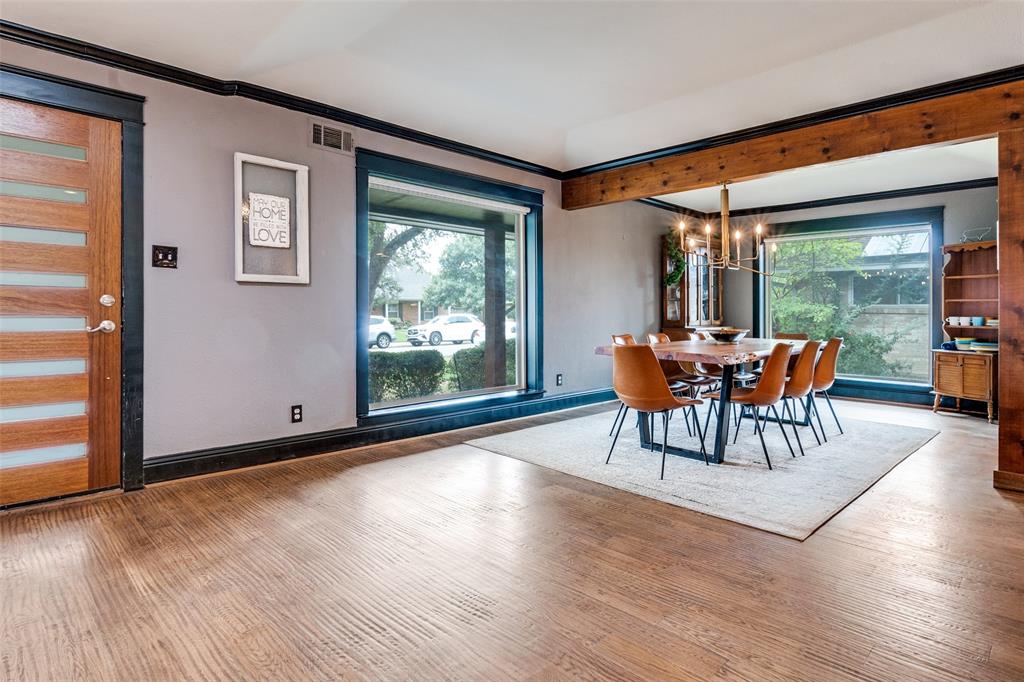 10355 Carry Back Circle Dallas, TX 75229 - Photo 9 of 35 a dining room with furniture and wooden floor