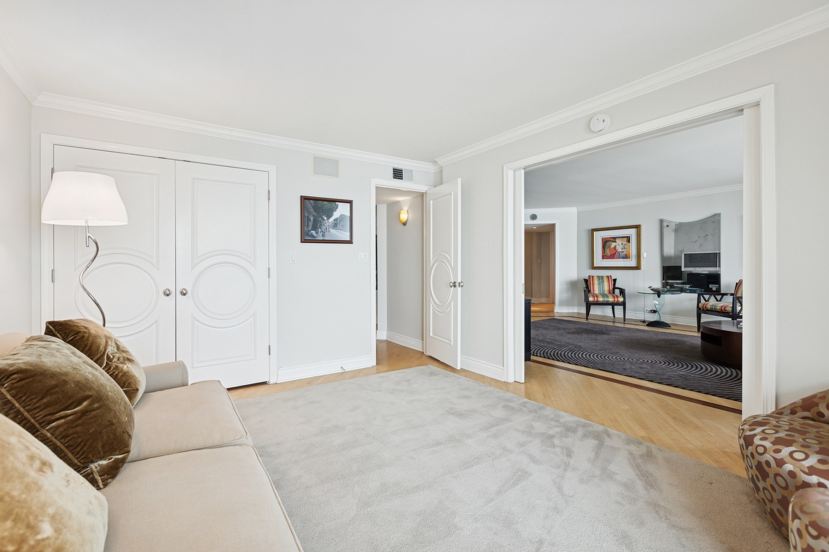 1212 North Lake Shore Drive, Unit 16BS Chicago, IL 60610 - Photo 19 of 26 a living room with furniture and a couch