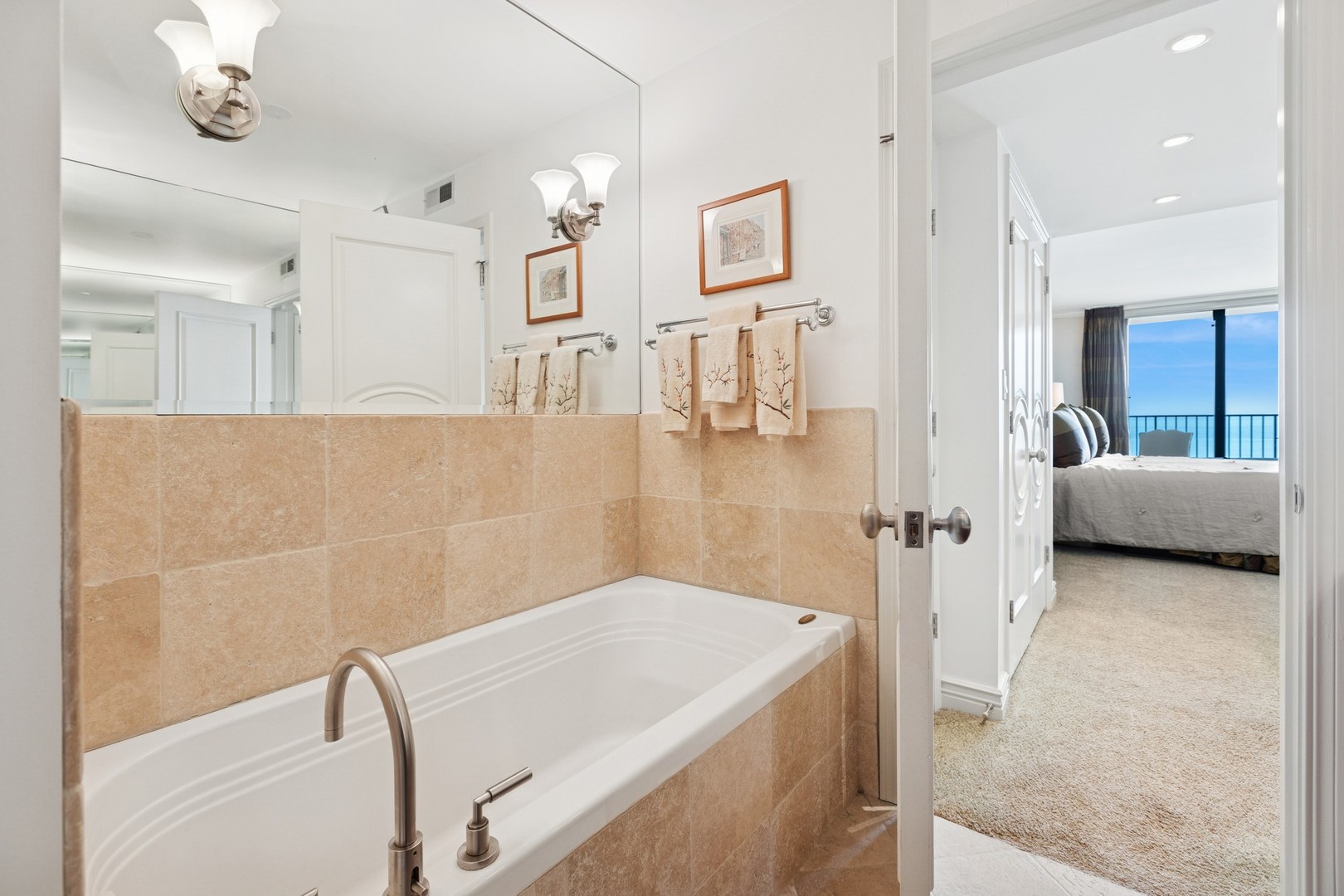1212 North Lake Shore Drive, Unit 16BS Chicago, IL 60610 - Photo 23 of 26 a en suite bathroom with a granite countertop sink