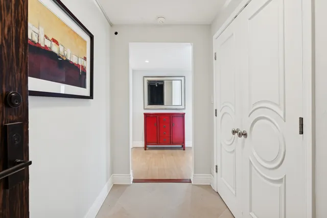a bathroom with a granite countertop mirror and a sink