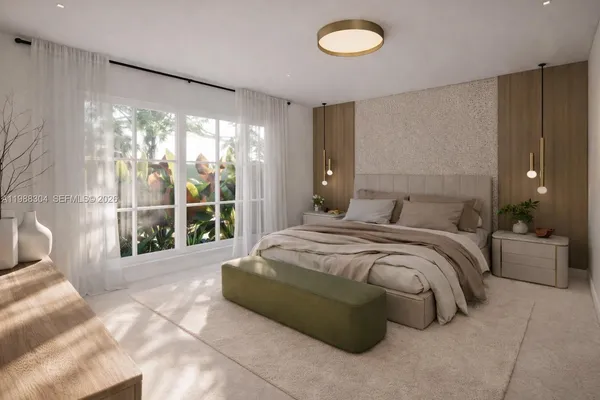 a spacious bedroom with a bed and glass window