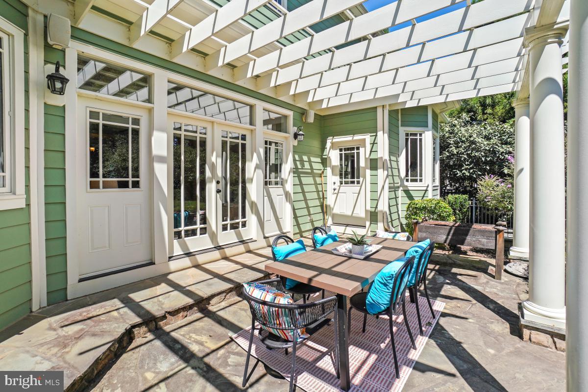 217 Talahi Road Southeast Vienna, VA 22180 - Photo 56 of 63 a view of a patio with a table and chairs in patio