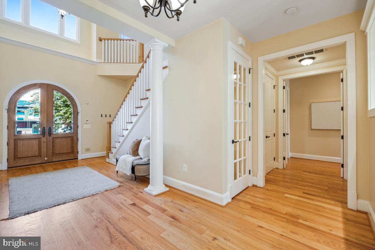 217 Talahi Road Southeast Vienna, VA 22180 - Photo 7 of 63 a view of an entryway with wooden floor and a livingroom view