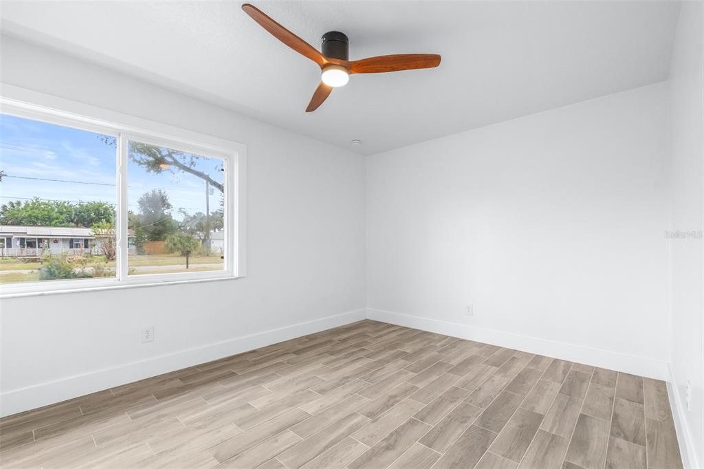 6312 Fairway Boulevard Apollo Beach, FL 33572 - Photo 24 of 58 an empty room with a window