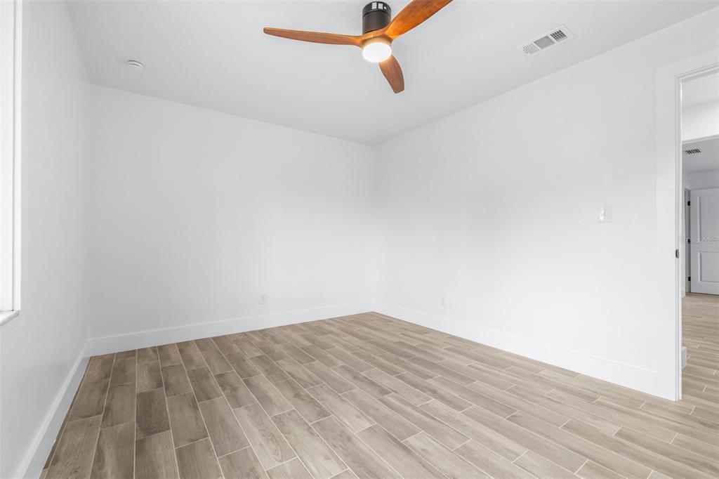 6312 Fairway Boulevard Apollo Beach, FL 33572 - Photo 25 of 58 a view of a room with wooden floor