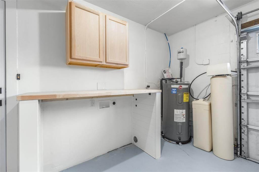 6312 Fairway Boulevard Apollo Beach, FL 33572 - Photo 31 of 58 a utility room with cabinets