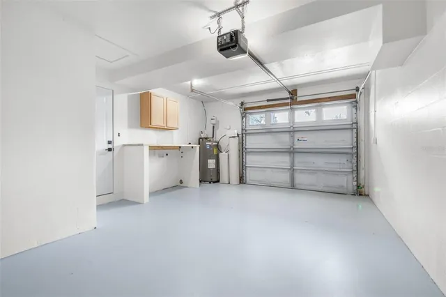 a view of a kitchen with a sink and a window