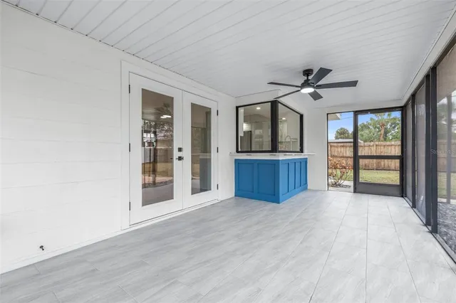 a house with sign broad in front of it