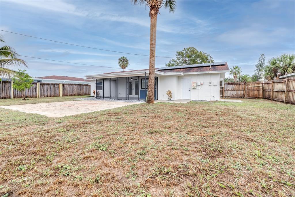 6312 Fairway Boulevard Apollo Beach, FL 33572 - Photo 41 of 58 a view of a house with a yard and potted plants