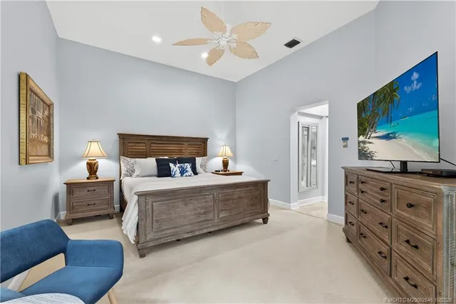 a bathroom with a double vanity sink mirror double and bathtub