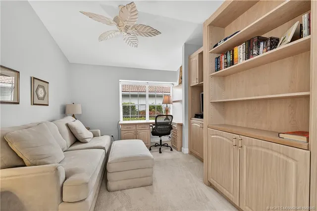 a spacious bathroom with a double vanity sink toilet and shower