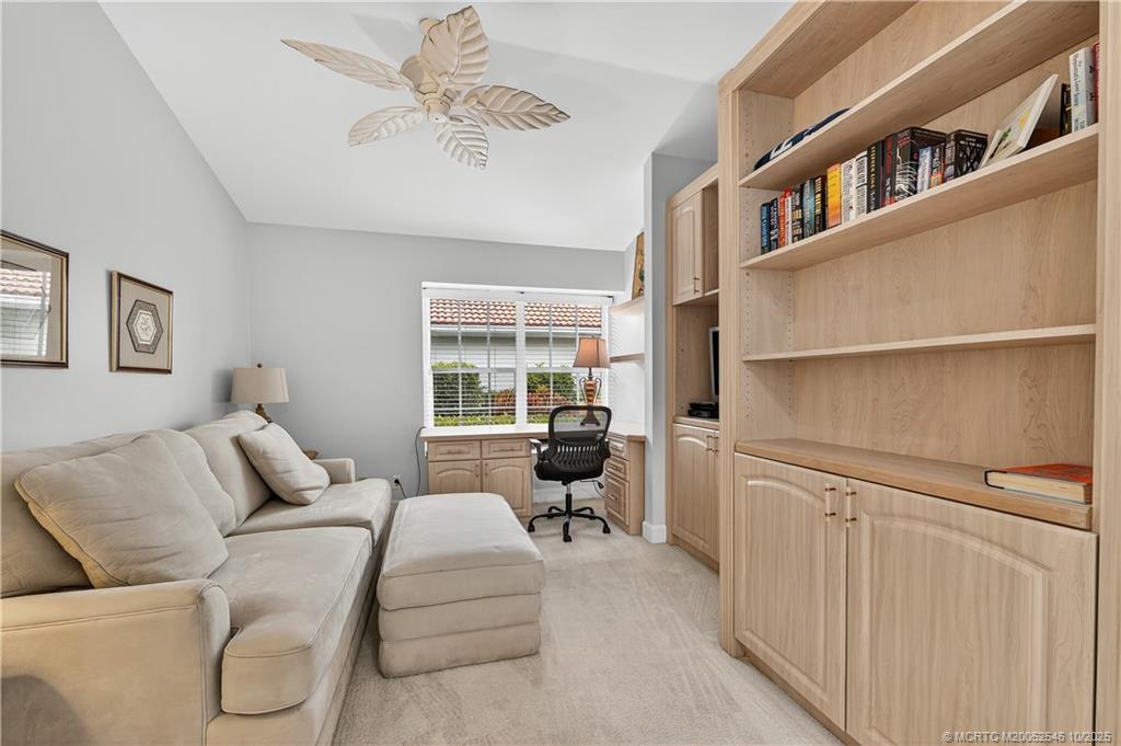13009 Harbour Ridge Boulevard Palm City, FL 34990 - Photo 19 of 38 a living room with furniture
