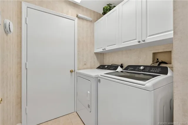 a view of a house with porch and furniture
