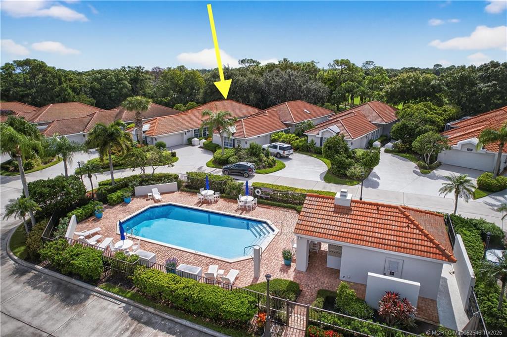 13009 Harbour Ridge Boulevard Palm City, FL 34990 - Photo 3 of 38 a view of house with outdoor space and pool