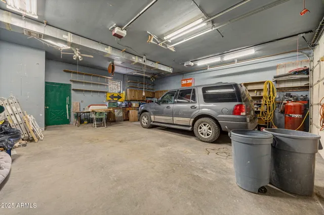 an empty room with a empty space and windows