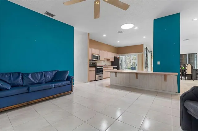 a view of a house with backyard and garden