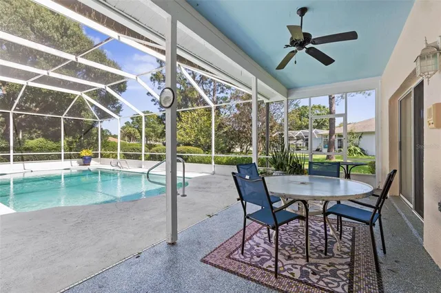 a front view of a house with yard and green space