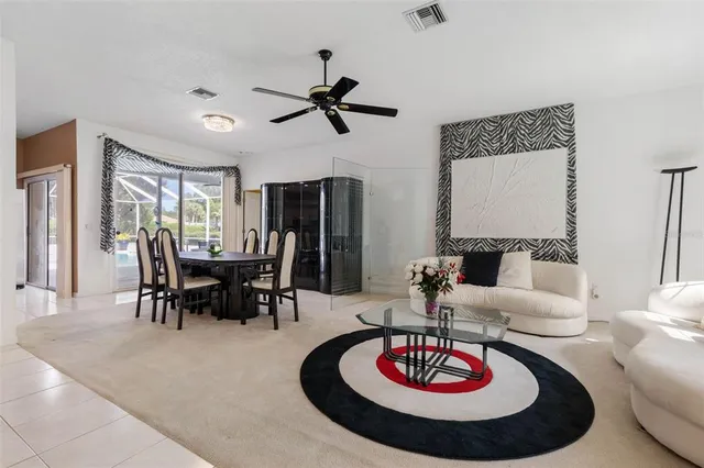 a living room with furniture and window