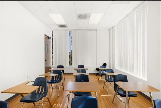 a view of a workspace with furniture