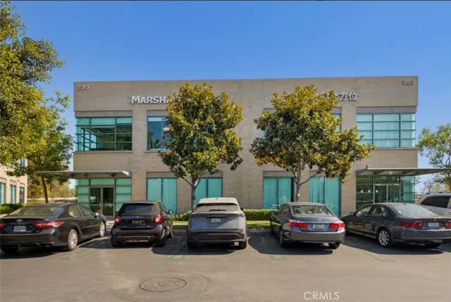 a view of street with parked cars