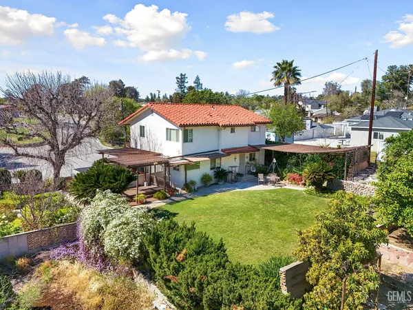 a view of a garden from a balcony