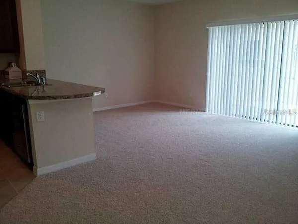 a view of a room that has a window in it