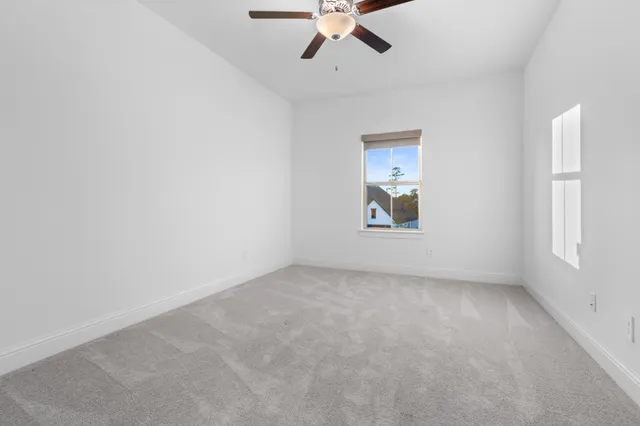 a house with swimming pool in front of it