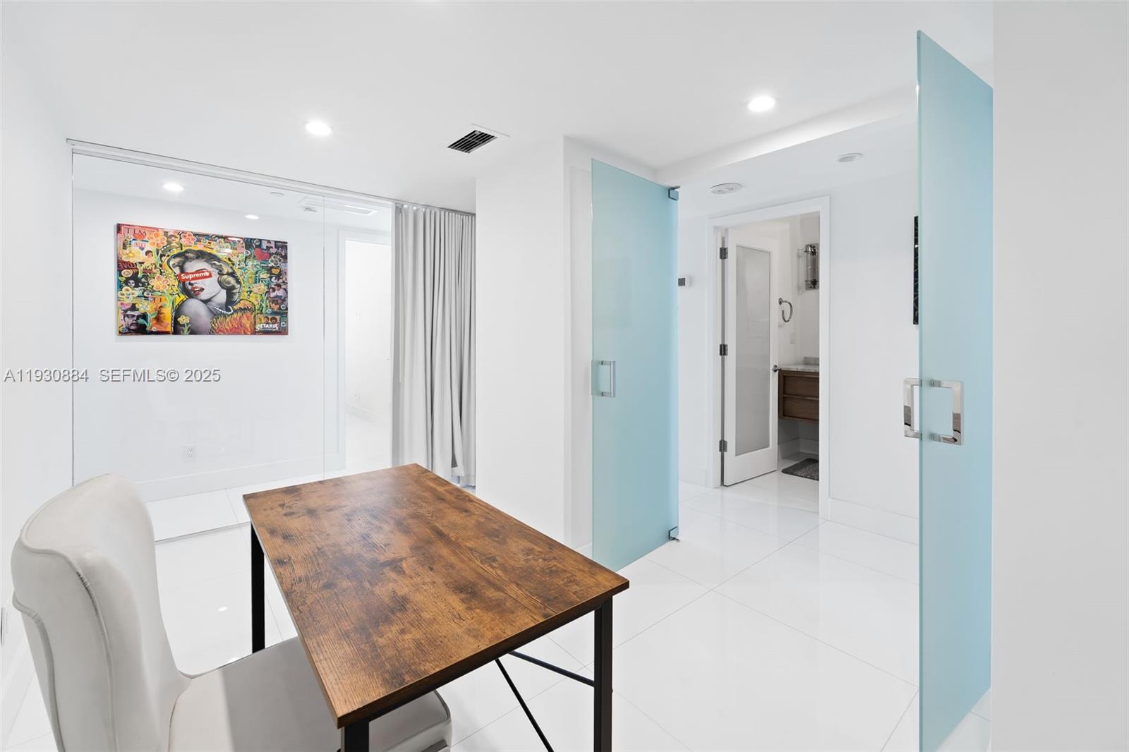 100 Lincoln Road, Unit 1523 Miami Beach, FL 33139 - Photo 16 of 24 a workspace with furniture and bathroom